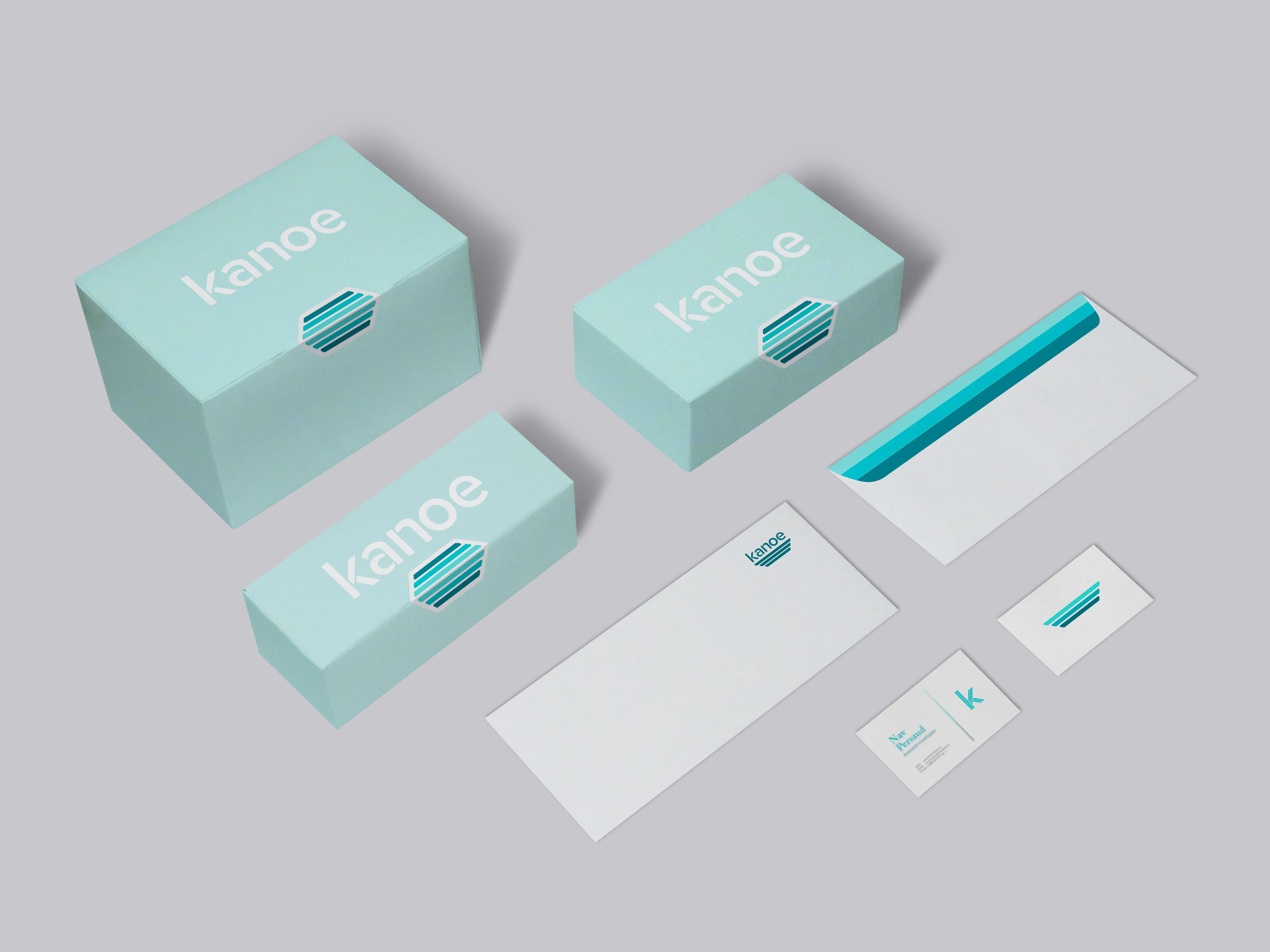 Kanoe identity applied to different carton sizes, envelopes and printed material in a teal palette.